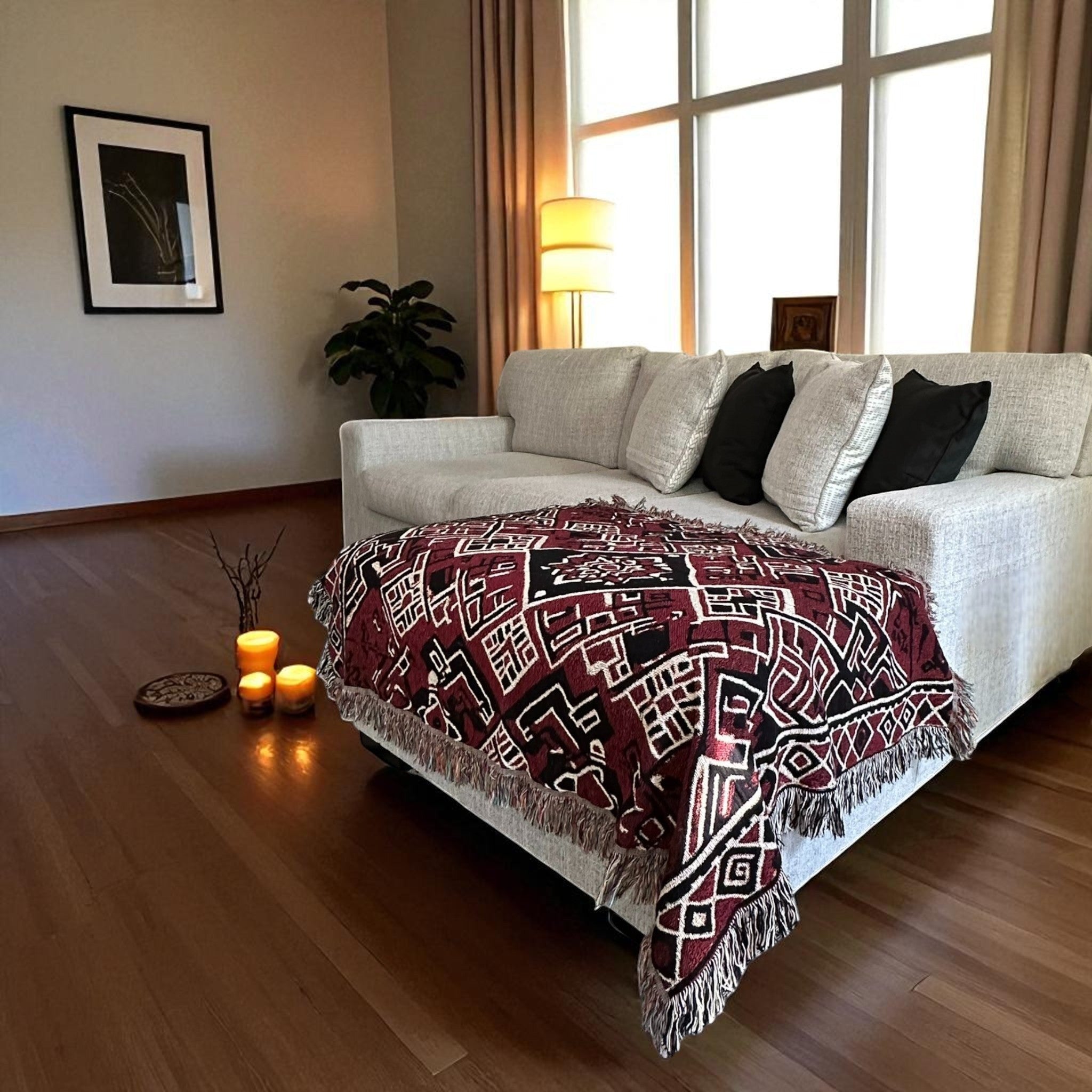 Kök Stüdyo Moroccan Berber-inspired woven throw blanket in deep red with geometric black and white pattern and fringe detail.