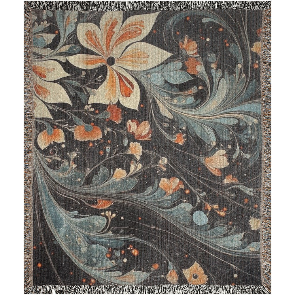 Kök Stüdyo Gothic Floral woven throw blanket in cotton, featuring a Turkish marbling design with orange and blue floral patterns on a dark background.