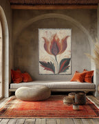 Kök Stüdyo woven throw blanket with a traditional Turkish marbling tulip design in warm orange and deep red hues, made of 100% cotton.