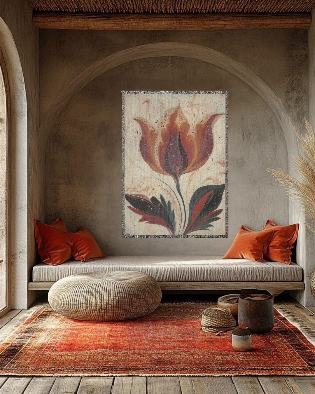 Kök Stüdyo woven throw blanket with a traditional Turkish marbling tulip design in warm orange and deep red hues, made of 100% cotton.