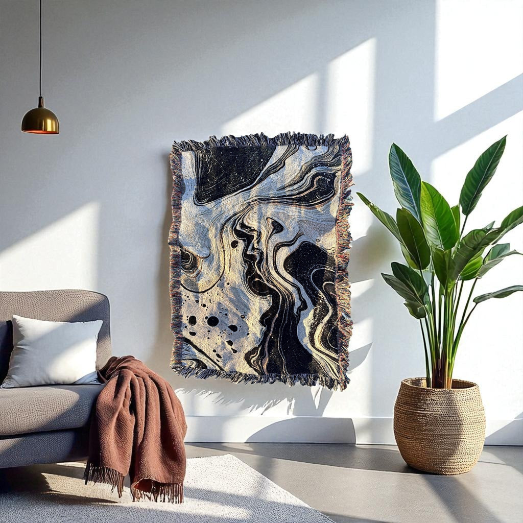 Kök Stüdyo abstract black and white Ebru marbling woven throw blanket, soft cotton tapestry with fringed edges.