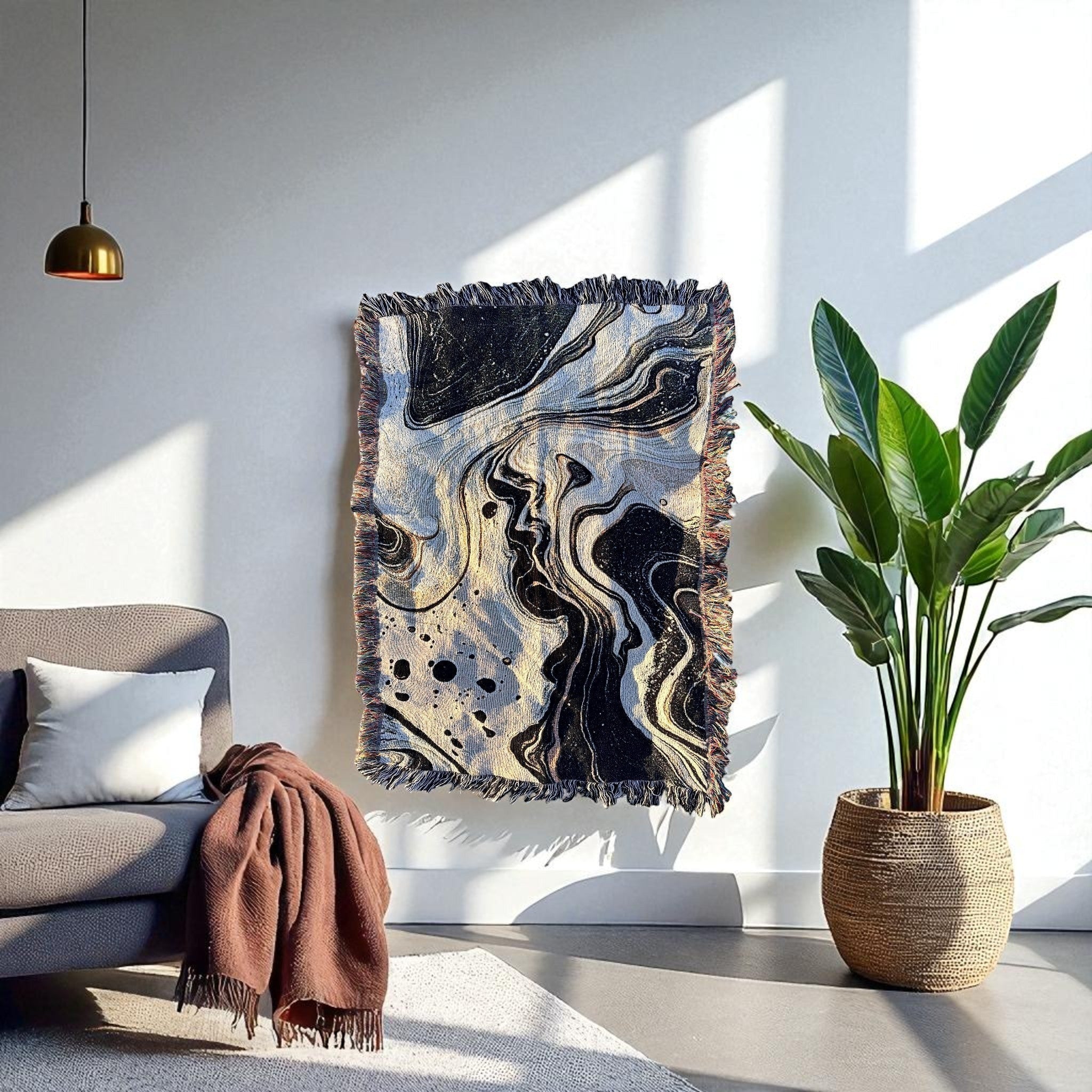 Kök Stüdyo abstract black and white Ebru marbling woven throw blanket, soft cotton tapestry with fringed edges.