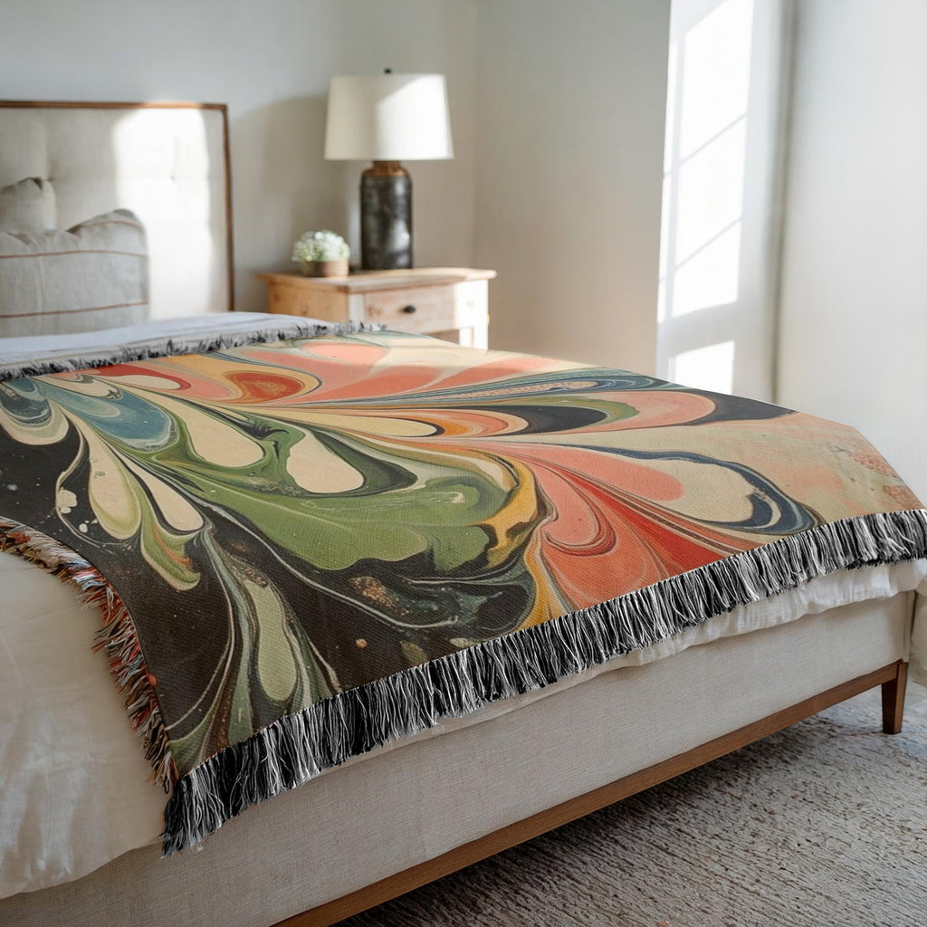 Kök Stüdyo abstract colorful Turkish marbling woven throw blanket in pure cotton with coral, green, blue, and black swirls.