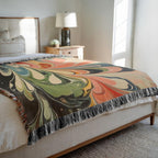 Kök Stüdyo abstract colorful Turkish marbling woven throw blanket in pure cotton with coral, green, blue, and black swirls.
