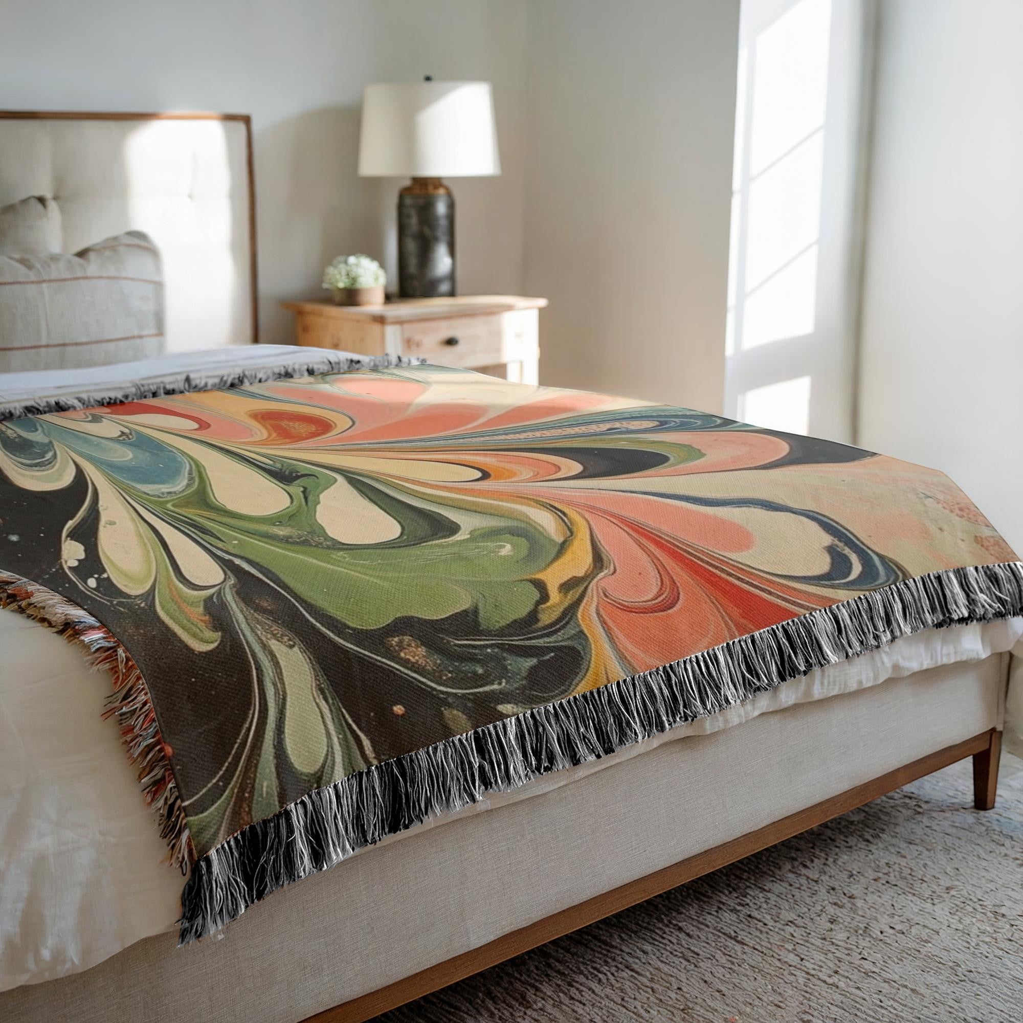Kök Stüdyo abstract colorful Turkish marbling woven throw blanket in pure cotton with coral, green, blue, and black swirls.